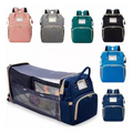 Maleta pañalera tipo morral abierta como cuna portátil, en varios colores